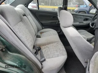 1998 Mitsubishi Mirage DE z VIN JA3AY26A2WU042095, wystawiony jako Copart lot #84700394 z przebiegiem 124 362 mil mil oraz Czysty tytuł • Clean title. Historia ofert i sprzedaży dostępna na DreamBid. Obrazek 10.