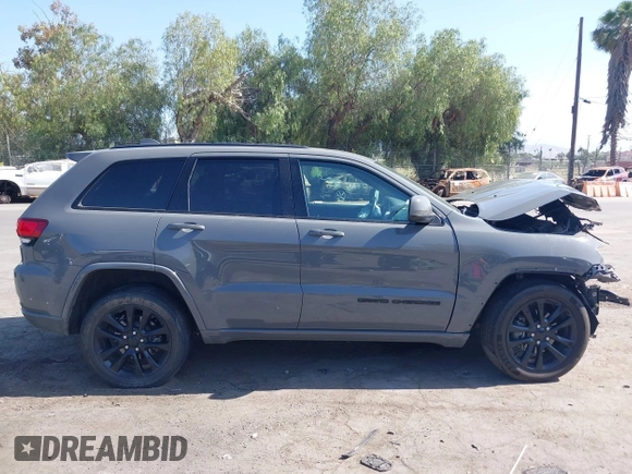 2020 Jeep Grand Cherokee Laredo E with VIN 1C4RJEAG3LC247027, listed as a IAAI auction lot 42538279 with 97,601 mi miles and . Bid and sale history available at DreamBid. Image 13.