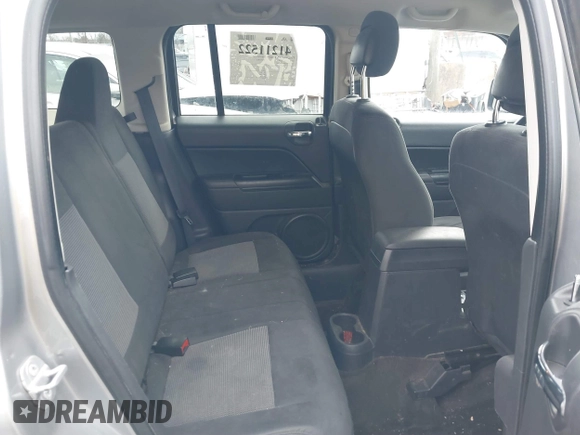 2014 Jeep Patriot Latitude with VIN 1C4NJRFB6ED778433, listed as a IAAI auction lot 41211522 with 127,506 mi miles. Bid and sale history available at carsss.com. Image 8.