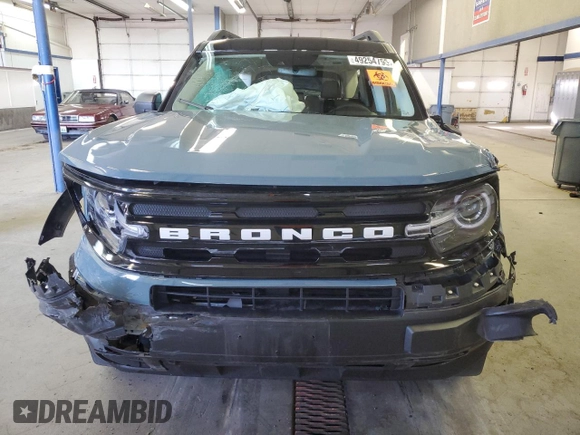 2022 Ford Bronco Sport Outer Banks z VIN 3FMCR9C60NRE06595, wystawiony jako Copart lot #49254795 z przebiegiem 20 947 mil mil oraz Szkoda całkowita • Salvage title. Historia ofert i sprzedaży dostępna na DreamBid. Obrazek 5.