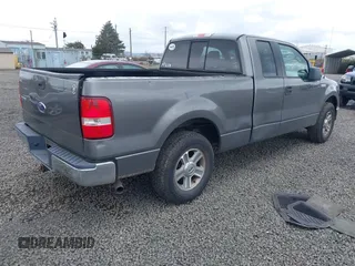 2005 Ford F-150 STX with VIN 1FTRX12W65NA60997, listed as a IAAI auction lot 41836976 with 170,400 mi miles. Bid and sale history available at carsss.com. Image 4.