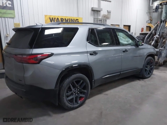 2023 Chevrolet Traverse Premier with VIN 1GNEVKKW5PJ194024, listed as a IAAI auction lot 41394613 with 28,958 mi miles. Bid and sale history available at carsss.com. Image 4.