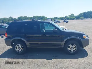 2005 Ford Escape XLT with VIN 1FMCU93115KE48930, listed as a IAAI auction lot 42592931 with 180,260 mi miles and . Bid and sale history available at DreamBid. Image 12.