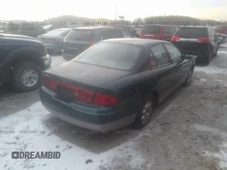 1999 Buick Regal GS with VIN 2G4WF5211X1632883, listed as a IAAI auction lot 33933409 with 271,039 mi miles and . Bid and sale history available at DreamBid. Image 4.