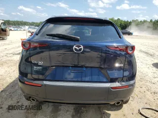 2024 Mazda CX-30 S Carbon Edition with VIN 3MVDMBCM2RM678452, listed as a Copart auction lot 61675535 with 9,573 mi miles and Salvage title. Bid and sale history available at DreamBid. Image 6.