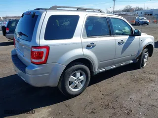 2008 Ford Escape XLT with VIN 1FMCU031X8KE76869, listed as a IAAI auction lot 41802935 with 155,746 mi miles. Bid and sale history available at carsss.com. Image 4.