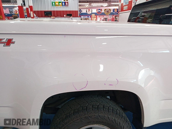 2017 Chevrolet Colorado 4WD Work Truck with VIN 1GCHTBEA2H1189408, listed as a IAAI auction lot 42679203 with 114,200 mi miles and . Bid and sale history available at DreamBid. Image 12.