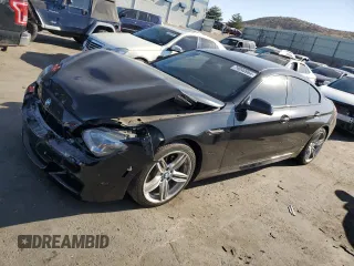 2014 BMW 6 Series 650i xDrive with VIN WBA6B4C52ED099386, listed as a Copart auction lot 74040964 with 96,931 mi miles and Salvage Title. Bid and sale history available at carsss.com. Image 1.