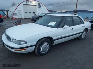 1997 Buick LeSabre Custom with VIN 1G4HP52K9VH552434, listed as a IAAI auction lot 41194261 with 102,633 mi miles. Bid and sale history available at carsss.com. Image 2.