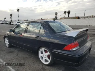 2003 Mitsubishi Lancer ES with VIN JA3AJ26E13U100300, listed as a Copart auction lot 46854775 with 164,722 mi miles and Salvage Title. Bid and sale history available at carsss.com. Image 2.