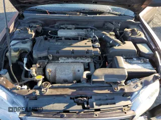 1999 Hyundai Elantra z VIN KMHJW25F1XU128645, wystawiony jako Copart lot #82970984 z przebiegiem 118 048 mil mil oraz Szkoda całkowita • Salvage title. Historia ofert i sprzedaży dostępna na DreamBid. Obrazek 11.