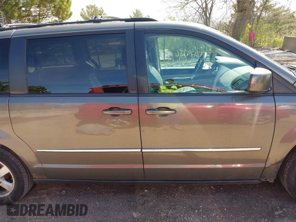 2010 Dodge Grand Caravan SXT with VIN 2D4RN5D1XAR293862, listed as a IAAI auction lot 42179737 with 324,144 mi miles and . Bid and sale history available at DreamBid. Image 13.