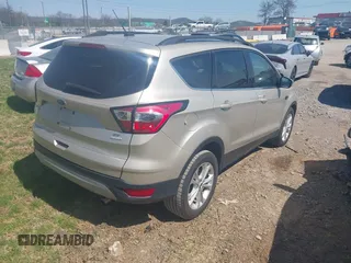 2017 Ford Escape SE with VIN 1FMCU0GD3HUC94245, listed as a IAAI auction lot 41877799 with 214,571 mi miles. Bid and sale history available at carsss.com. Image 4.