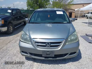 2007 Honda Odyssey EX with VIN 5FNRL38457B042912, listed as a IAAI auction lot 41992847 with 194,822 mi miles and . Bid and sale history available at DreamBid. Image 12.
