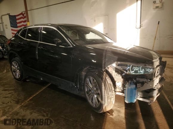 2022 BMW X2 xDrive28i with VIN WBXYJ1C07N5U38996, listed as a Copart auction lot 42139835 with 55,413 mi miles and Salvage Title. Bid and sale history available at carsss.com. Image 4.