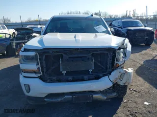 2016 Chevrolet Silverado 1500 LT with VIN 3GCUKREC6GG306239, listed as a IAAI auction lot 41380251 with 128,042 mi miles. Bid and sale history available at carsss.com. Image 13.