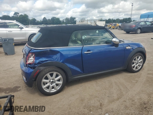 2015 MINI Convertible S with VIN WMWZP3C59F2A91231, listed as a Copart auction lot 59296415 with 31,642 mi miles and Salvage title. Bid and sale history available at DreamBid. Image 3.