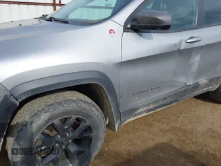 2015 Jeep Cherokee Trailhawk with VIN 1C4PJMBS0FW522182, listed as a IAAI auction lot 42544508 with 74,910 mi miles and . Bid and sale history available at DreamBid. Image 6.