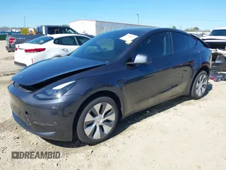2024 Tesla Model Y Long Range z VIN 7SAYGDEE8RA262082, wystawiony jako IAAI lot #41834216 z przebiegiem 11 536 mil mil oraz . Historia ofert i sprzedaży dostępna na DreamBid. Obrazek 2.