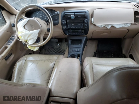 2000 Ford Explorer Eddie Bauer with VIN 1FMZU74E4YZA75510, listed as a Copart auction lot 75601964 with 196,180 mi miles and Salvage title. Bid and sale history available at DreamBid. Image 8.