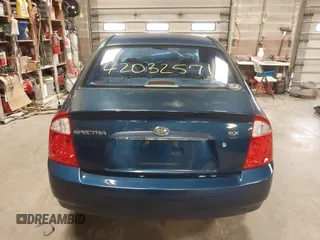 2004 Kia Spectra LX with VIN KNAFE121145012249, listed as a IAAI auction lot 42032571 with 146,748 mi miles. Bid and sale history available at carsss.com. Image 17.