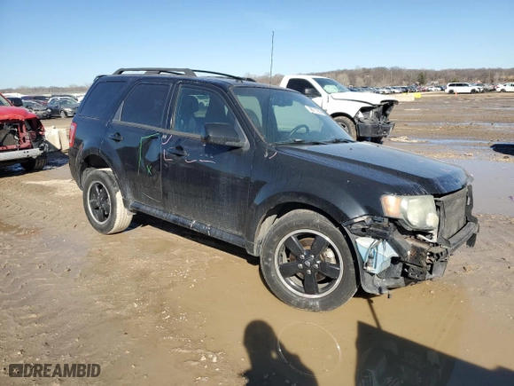 2010 Ford Escape XLT with VIN 1FMCU0D72AKA85305, listed as a Copart auction lot 46711265 with 120,416 mi miles and Salvage Title. Bid and sale history available at carsss.com. Image 4.