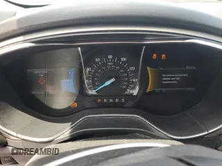 2013 Ford Fusion SE z VIN 3FA6P0H97DR215735, wystawiony jako Copart lot #62326335 z przebiegiem 100 312 mil mil oraz Szkoda całkowita • Salvage title. Historia ofert i sprzedaży dostępna na DreamBid. Obrazek 9.