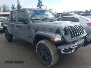 2021 Jeep Gladiator Willys with VIN 1C6HJTAG5ML616706, listed as a IAAI auction lot 41367142 with 50,951 mi miles. Bid and sale history available at carsss.com. Image 1.