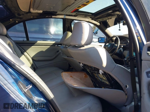 2003 BMW 3 Series 325i with VIN WBAEV33403KL61113, listed as a IAAI auction lot 41775831 with 199,126 mi miles and . Bid and sale history available at DreamBid. Image 8.