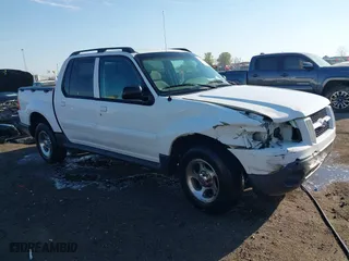2004 Ford Explorer Sport Trac XLS with VIN 1FMZU67K04UC22800, listed as a IAAI auction lot 41869208 with 157,711 mi miles. Bid and sale history available at carsss.com. Image 13.