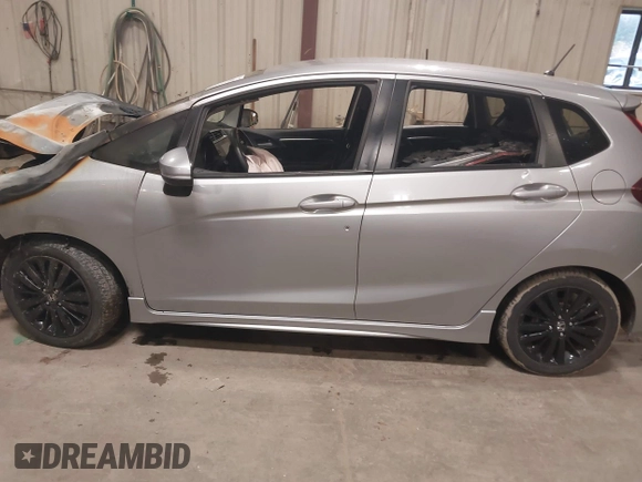 2018 Honda Fit Sport with VIN 3HGGK5G60JM719054, listed as a IAAI auction lot 40612169 with Not Provided miles and . Bid and sale history available at DreamBid. Image 14.