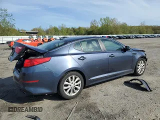 2015 Kia Optima EX with VIN 5XXGN4A76FG403930, listed as a Copart auction lot 53865035 with 154,579 mi miles and Clean Title. Bid and sale history available at DreamBid. Image 3.