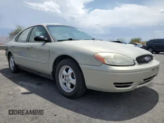 2007 Ford Taurus SE with VIN 1FAFP53U27A156844, listed as a Copart auction lot 59204695 with 157,633 mi miles and Salvage title. Bid and sale history available at DreamBid. Image 4.