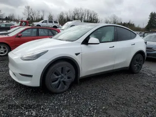 2024 Tesla Model Y Long Range with VIN 7SAYGDEE5RF115706, listed as a Copart auction lot 45002255 with 9,255 mi miles and Salvage Title. Bid and sale history available at DreamBid. Image 1.