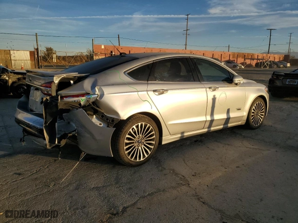 2017 Ford Fusion Energi Titanium with VIN 3FA6P0SUXHR379807, listed as a Copart auction lot 84885494 with 100,735 mi miles and Salvage Title. Bid and sale history available at carsss.com. Image 3.