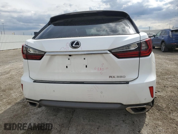 2018 Lexus RX 350 with VIN 2T2BZMCA9JC159824, listed as a Copart auction lot 57145165 with 55,753 mi miles and Salvage title. Bid and sale history available at DreamBid. Image 6.