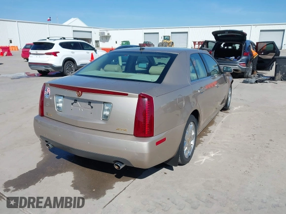 2005 Cadillac STS z VIN 1G6DC67A950171835, wystawiony jako IAAI lot #41599105 z przebiegiem 74 235 mil mil oraz . Historia ofert i sprzedaży dostępna na DreamBid. Obrazek 4.