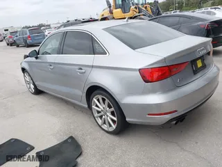 2015 Audi A3 1.8T Premium with VIN WAUACGFF3F1028231, listed as a IAAI auction lot 41586957 with 122,927 mi miles. Bid and sale history available at carsss.com. Image 3.