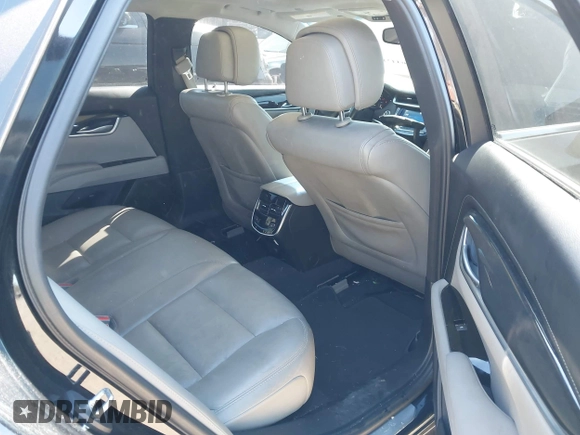 2013 Cadillac XTS Luxury z VIN 2G61R5S33D9184878, wystawiony jako IAAI lot #41644213 z przebiegiem 113 293 mil mil oraz . Historia ofert i sprzedaży dostępna na DreamBid. Obrazek 8.
