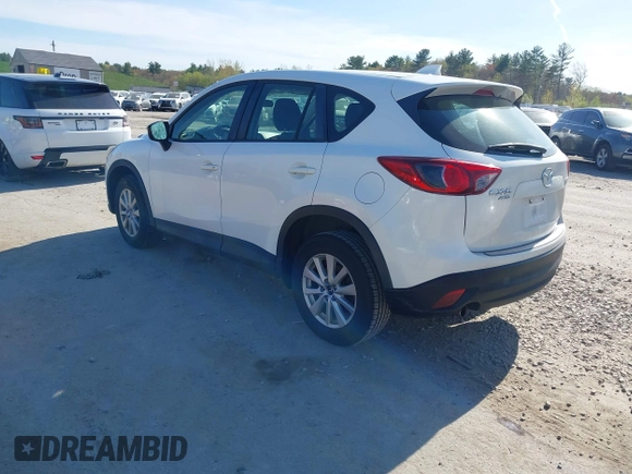 2015 Mazda CX-5 Sport with VIN JM3KE4BY3F0495511, listed as a IAAI auction lot 42170968 with 206,217 mi miles and . Bid and sale history available at carsss.com. Image 3.