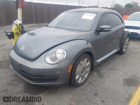 2013 Volkswagen Beetle 2.5L with VIN 3VWJP7AT6DM667477, listed as a IAAI auction lot 42215545 with 87,392 mi miles and . Bid and sale history available at DreamBid. Image 17.