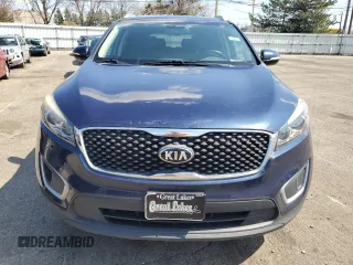 2018 Kia Sorento L with VIN 5XYPG4A38JG395647, listed as a Copart auction lot 52682345 with 123,831 mi miles and Clean Title. Bid and sale history available at carsss.com. Image 5.