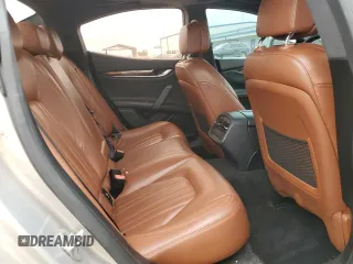 2015 Maserati Ghibli S Q4 z VIN ZAM57RTA1F1138087, wystawiony jako Copart lot #58412195 z przebiegiem 111 206 mil mil oraz Szkoda całkowita • Salvage title. Historia ofert i sprzedaży dostępna na DreamBid. Obrazek 10.