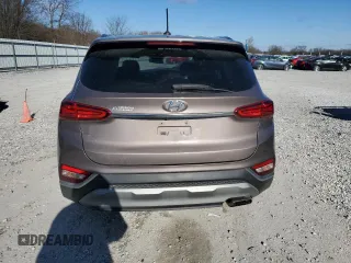 2019 Hyundai Santa Fe SE z VIN 5NMS23AD9KH023222, wystawiony jako Copart lot #86827124 z przebiegiem 129 726 mil mil oraz Szkoda całkowita • Salvage title. Historia ofert i sprzedaży dostępna na DreamBid. Obrazek 6.