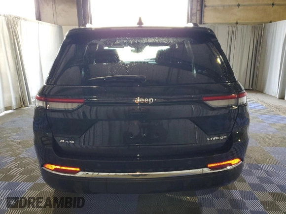 2023 Jeep Grand Cherokee Laredo with VIN 1C4RJHAG7P8866871, listed as a Copart auction lot 58341235 with 48,737 mi miles and Salvage title. Bid and sale history available at DreamBid. Image 6.