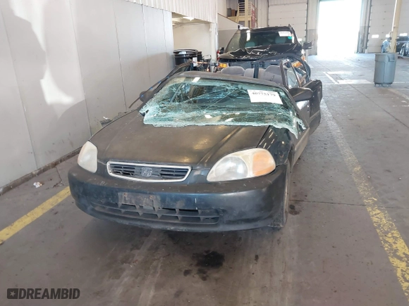 1996 Honda Civic DX with VIN 1HGEJ6625TL019386, listed as a IAAI auction lot 40775179 with 212,267 mi miles. Bid and sale history available at carsss.com. Image 13.