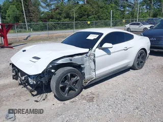 2018 Ford Mustang EcoBoost z VIN 1FA6P8TH2J5112959, wystawiony jako IAAI lot #42110990 z przebiegiem 97 088 mil mil oraz . Historia ofert i sprzedaży dostępna na DreamBid. Obrazek 17.