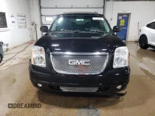 2009 GMC Yukon Denali z VIN 1GKFK03279R282409, wystawiony jako Copart lot #51534755 z przebiegiem 197 150 mil mil oraz Tytuł czysty. Historia ofert i sprzedaży dostępna na DreamBid. Obrazek 5.