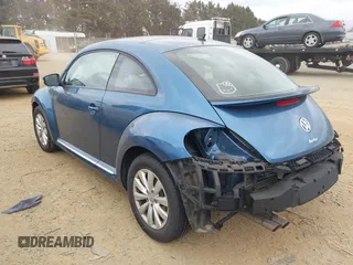 2019 Volkswagen Beetle S with VIN 3VWFD7AT8KM708865, listed as a IAAI auction lot 41692756 with 35,070 mi miles. Bid and sale history available at carsss.com. Image 3.