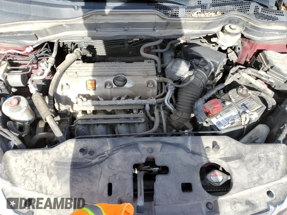 2011 Honda CR-V SE z VIN JHLRE4H49BC014216, wystawiony jako Copart lot #56607785 z przebiegiem 143 006 mil mil oraz Szkoda całkowita • Salvage title. Historia ofert i sprzedaży dostępna na DreamBid. Obrazek 11.